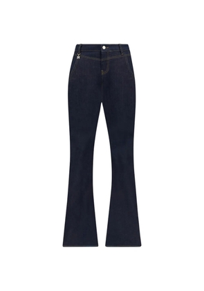 AMIRI logo-charm bootcut jeans - Blue