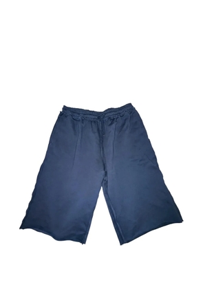 GrEeDy uNiT Multi Tag raw-cut shorts - Blue