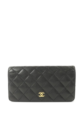CHANEL Pre-Owned CC quilted long wallet - Black