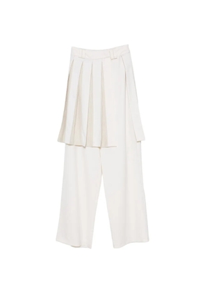 Vestiaire d'un Oiseau Libre pleated layered trousers - White