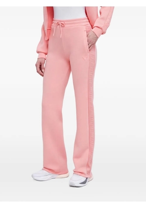 GUESS USA logo-embossed drawstring track pants - Pink