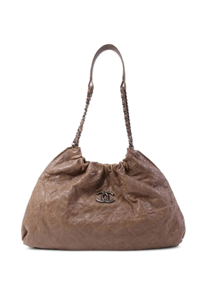 CHANEL Pre-Owned CC diamond-quilted shoulder bag - Brown