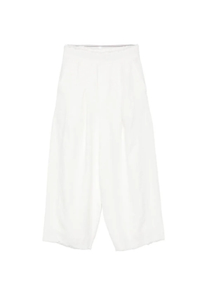 Osklen pleated frayed-hem linen trousers - White