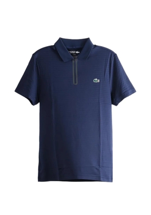 Lacoste logo-patch zip-fastening polo shirt - Blue