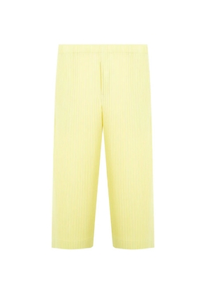 Issey Miyake plissé-effect trousers - Yellow