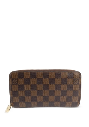Louis Vuitton Pre-Owned Damier Ebene zippy wallet - Brown