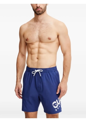 GUESS USA logo-print drawstring swim shorts - Blue