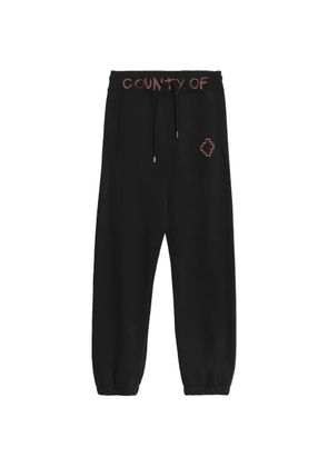 COUNTY OF MILAN logo-detail track pants - Black