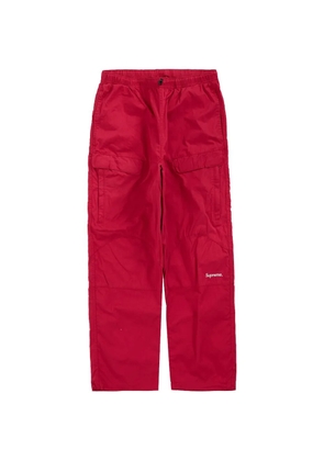Supreme logo-print loose-fit trousers - Red