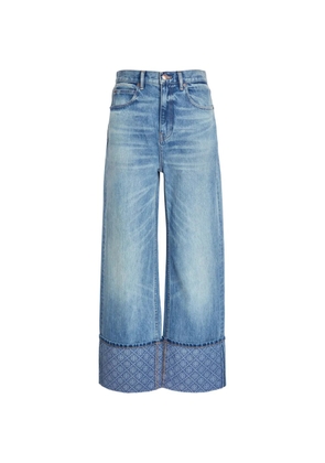 Tory Burch monogram-print turned-up jeans - Blue