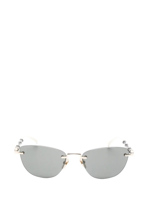 Gucci Eyewear Bamboo rimless cat-eye frame sunglasses - Gold