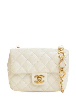 CHANEL Pre-Owned 2021-2026 Mini Square Classic Patent Enamel Coco Hearts Single Flap crossbody bag - White