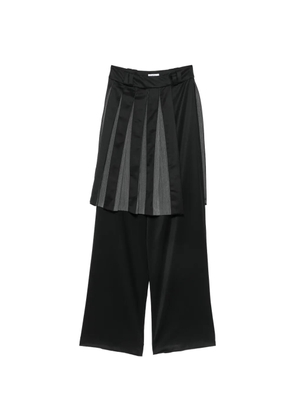 Vestiaire d'un Oiseau Libre pleated panelled trousers - Black