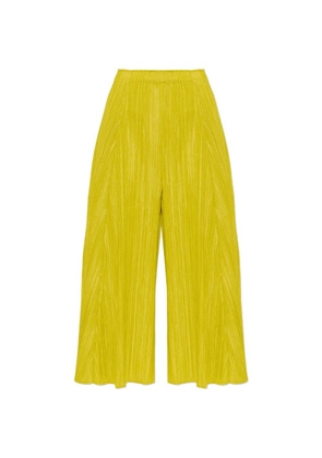 Pleats Please Issey Miyake Mellow pleated trousers - Yellow