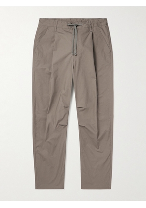 JOHN ELLIOTT - Studio Tapered Pleated Cotton Drawstring Trousers - Men - Neutrals - S
