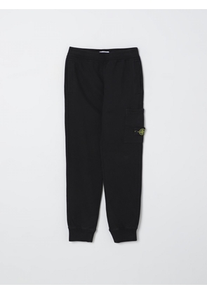 STONE ISLAND JUNIOR Pants Kids color Black