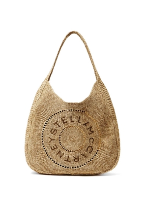 Stella McCartney logo-perforated raffia tote bag - Neutrals