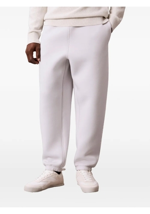 Calvin Klein logo-embroidered track pants - Grey