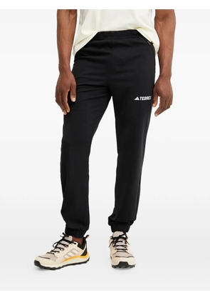 adidas Terrex Multi logo-print track pants - Black