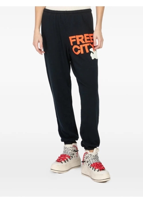 FreeCity logo-print track pants - Black