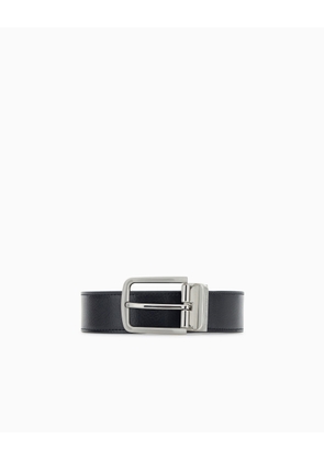 Smooth leather tongue belt with an engraved metal buckle