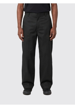 CARHARTT WIP Pants Men color Black