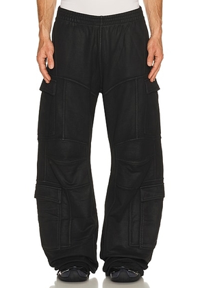 Balenciaga Cargo Pants in Black - Black. Size M (also in L, XL).