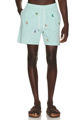Polo Ralph Lauren Stretch Seersucker Traveler Swim Trunk in Key West Green Stripe - Green. Size S (also in M, L, XL/1X, XXL/2X).