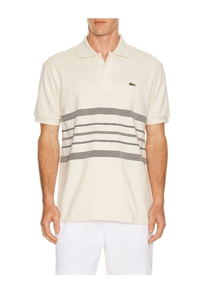 Lacoste Polo in Cream. Size 3. Also in 4, 5, 6, 7.
