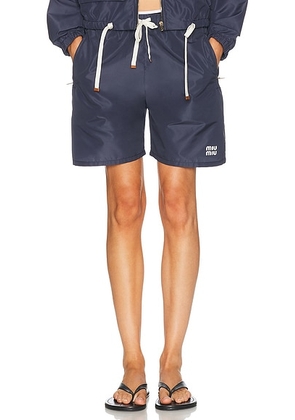 Miu Miu Tela Tec Short in Bleu - Blue. Size 42 (also in 38, 40).