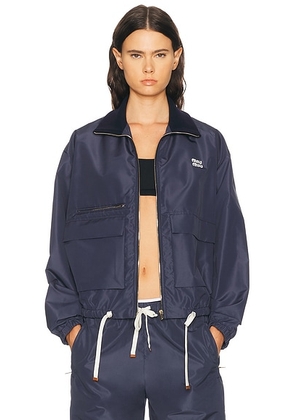 Miu Miu Tela Tec Jacket in Bleu - Blue. Size 38 (also in 36, 40).