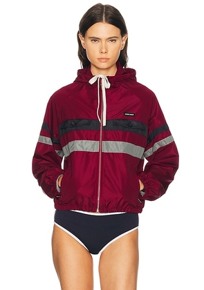 Miu Miu Seta Tec Jacket in Rosso - Red. Size 42 (also in 40).