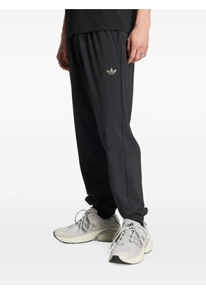 adidas Tech Trefoil Essentials track pants - Black