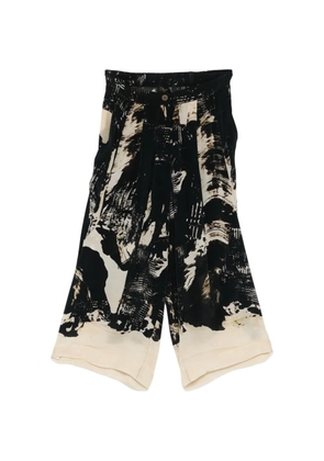 RAGA abstract-print trousers - Black