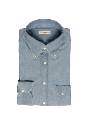 Luciano Barbera blue shirt
