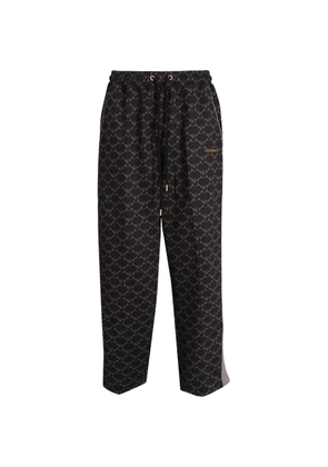 A BATHING APE® monogram drawstring track pants - Black