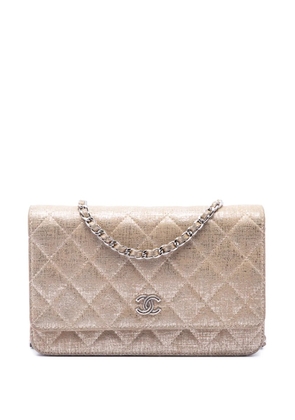 CHANEL Pre-Owned 2014 CC Quilted Metallic Fabric Wallet On Chain crossbody bag - Gold