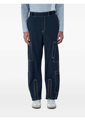NÒMARYTHM TEXTILE contrast-stitch cargo pants - Black