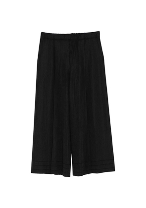 Pleats Please Issey Miyake A-POC pleated trousers - Black