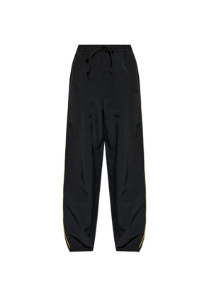 Moschino tape-measure side-stripe track pants - Black