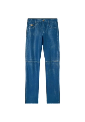 Versace distressed-design trousers - Blue