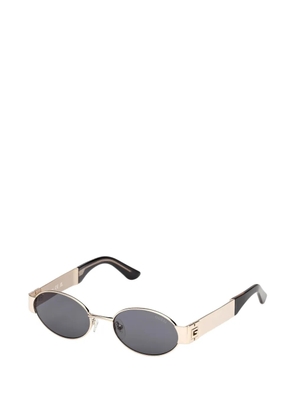GUESS EYEWEAR oval-frame sunglasses - Gold