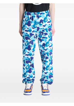 A BATHING APE® Abc Camo Ape Head track pants - Blue