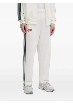adidas Firebird stripe logo track pants - White