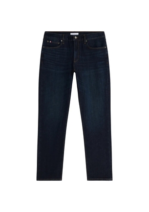 Tommy Hilfiger logo-patch straight-leg jeans - Blue