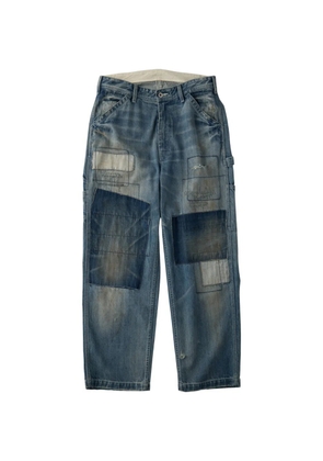 UNIVERSAL OVERALL patchwork distressed jeans - Blue