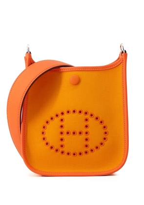 Hermès Pre-Owned 2024 Toile Officier and Swift Neo Evelyne 16 shoulder bag - Orange