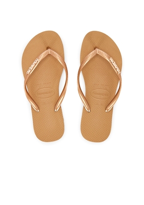 Havaianas Slim Logo Metallic Sandal in Metallic Gold. Size 37/38. Also in 41/42, 35/36, 39/40.