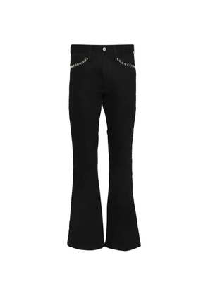MARKING DISTANCE Boogie stud-embellished jeans - Black
