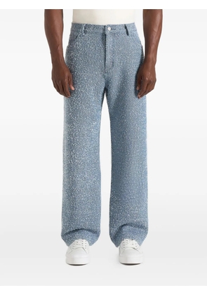 Manière De Voir Arnault in blue boucle denim relaxed-fit jeans